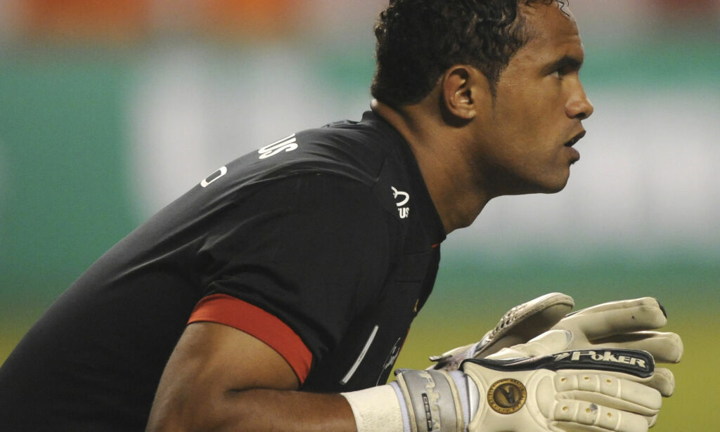 FILE - This April 7, 2010 file photo shows Flamengo's goalkeeper Bruno Fernandes de Souza during a soccer game in Rio de Janeiro, Brazil. Boa Esporte, a Brazilian soccer club, presented Souza on Tuesday, March 14, 2017, to announce his signing as goalkeeper. Souza was convicted in the killing of an ex-girlfriend, prompting outrage from many. He is free while appealing a 22-year prison sentence. (AP Photo/Felipe Dana, File)