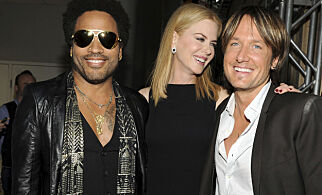 FILE - In this June 5, 2013, file photo, musician Lenny Kravitz, left, actress Nicole Kidman and country singer Keith Urban pose at the 2013 CMT Music Awards at Bridgestone Arena in Nashville, Tenn. Kidman has revealed that she was once engaged to Kravitz. Kidman confirmed the engagement with the rocker in a recent interview with Net-A-Porter's magazine "The Edit," in which she was discussing her upcoming HBO series "Big Little Lies." (Photo by Frank Micelotta/Invision/AP, File)